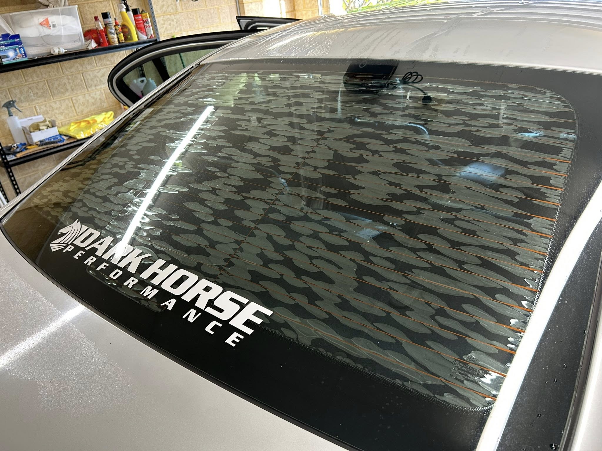 Car window tint removal before — old bubbling peeling tint Perth